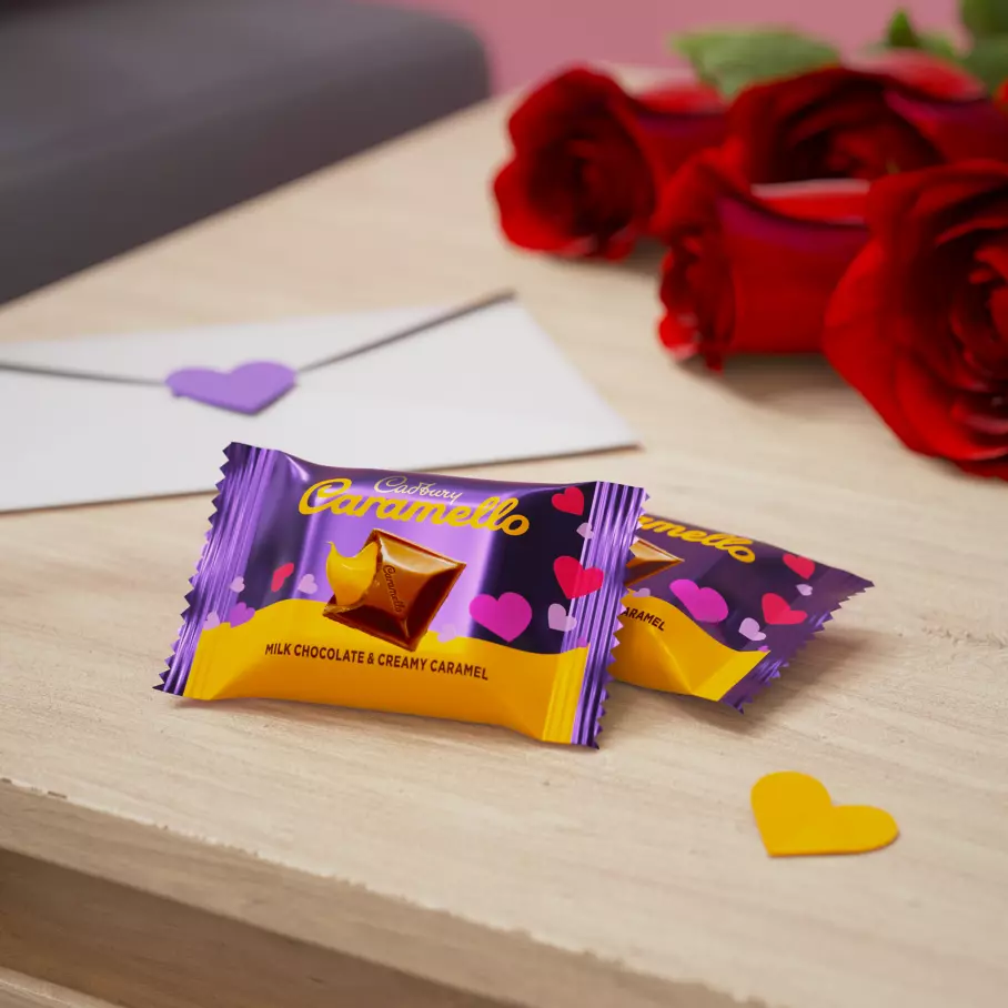 individually wrapped packs of cadbury caramello miniature candy bars on desktop