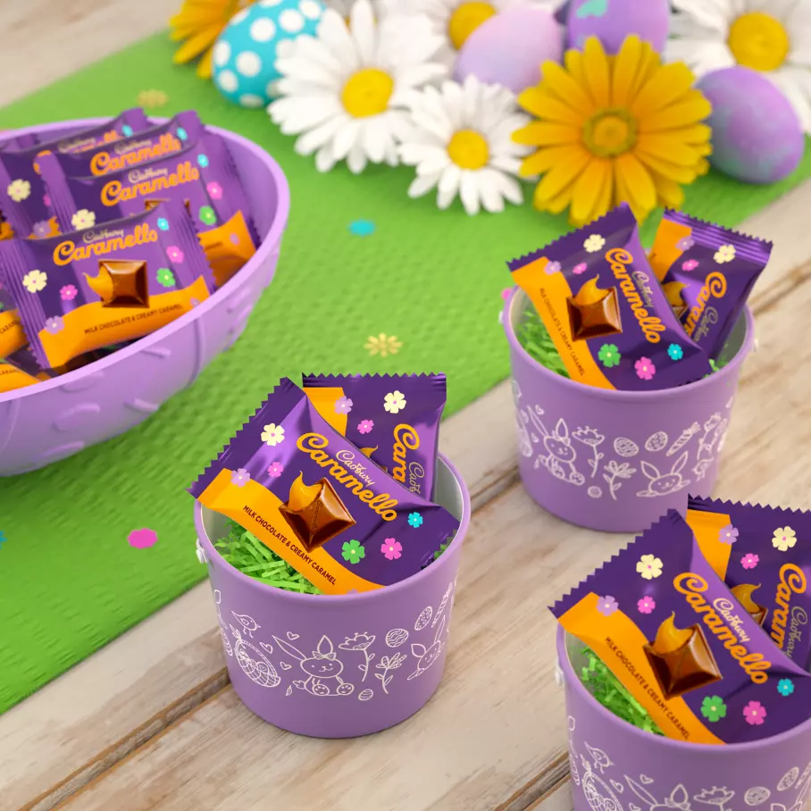 easter themed bowls full of individually wrapped cadbury caramello miniature candy bars
