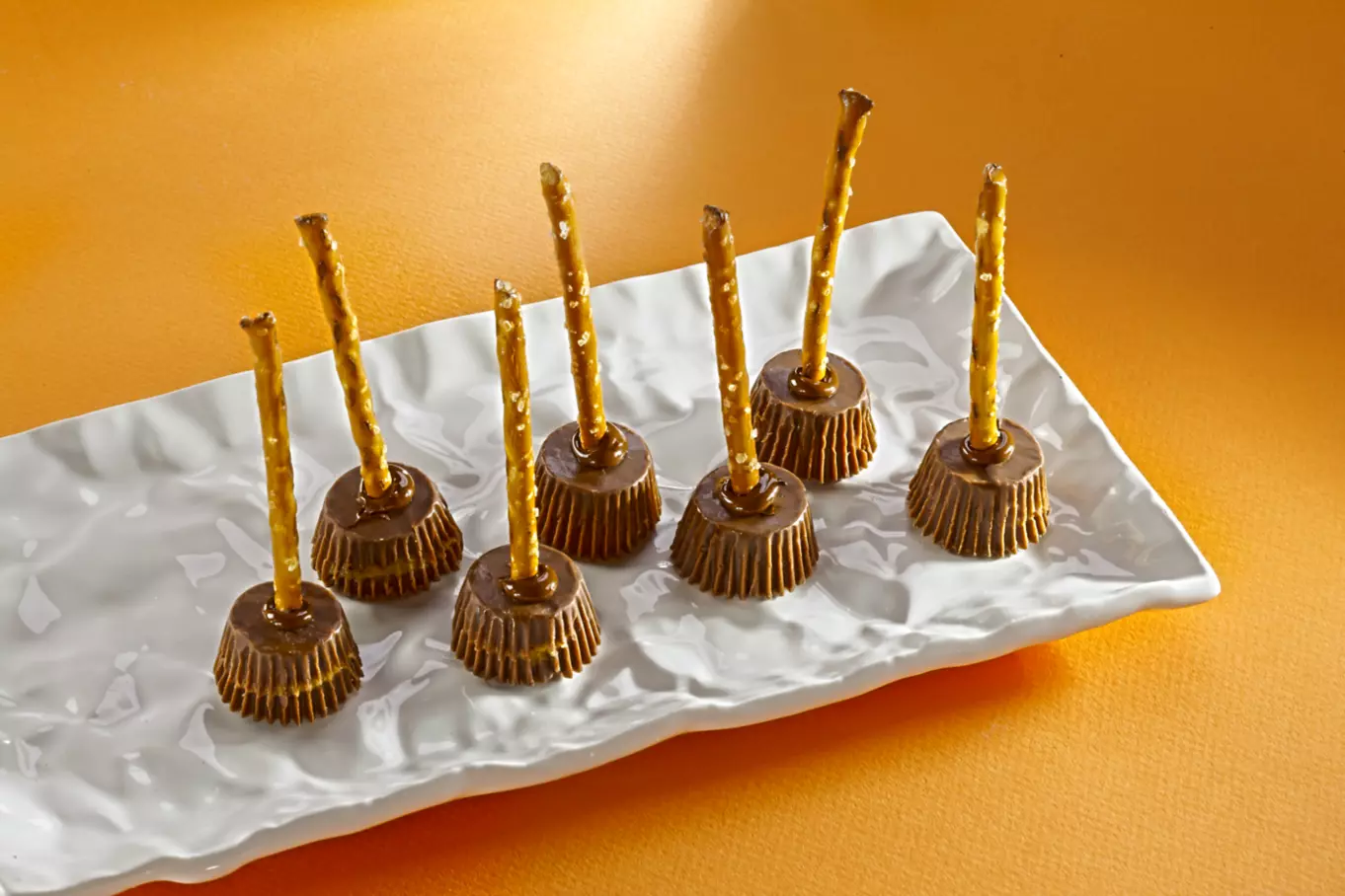 Tray of freshly made reeses miniatures witchs broomsticks