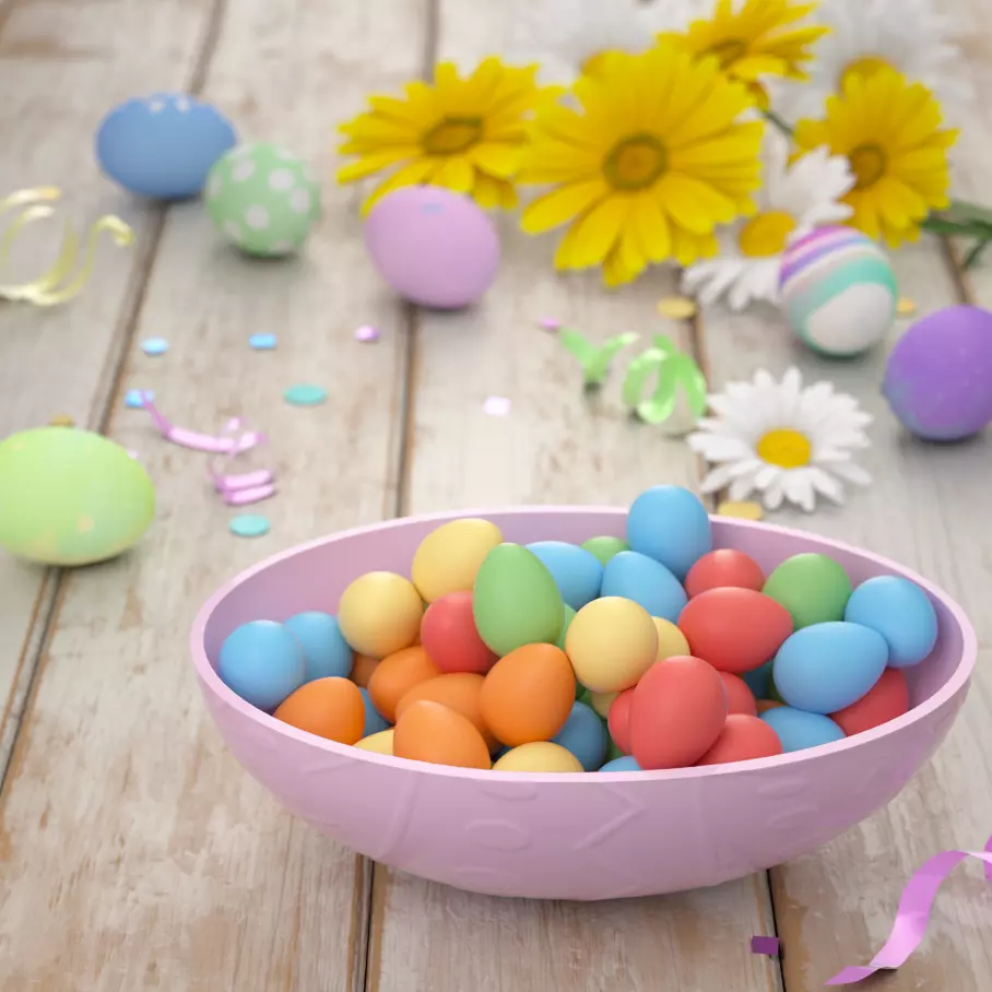 egg shaped bowl filled with cadbury mini eggs rainbow milk chocolate candy