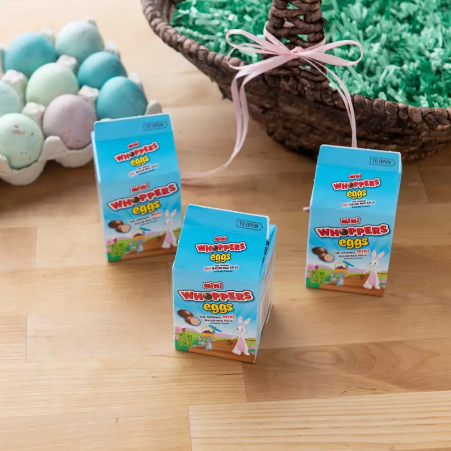 WHOPPERS MINI EGGS catrons beside Easter eggs