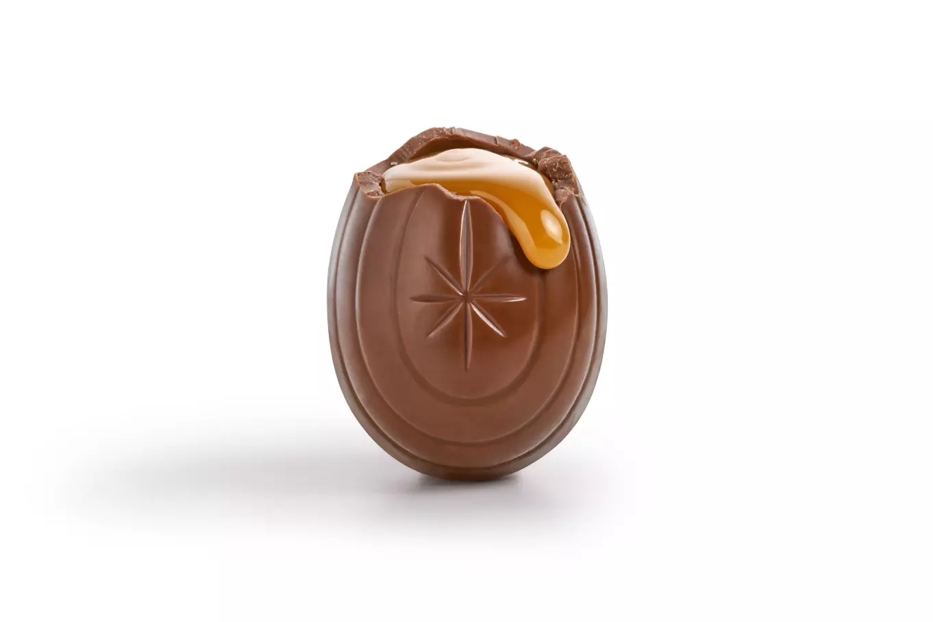 CADBURY CARAMEL EGG Mini Milk Chocolate Egg unwrapped and split open