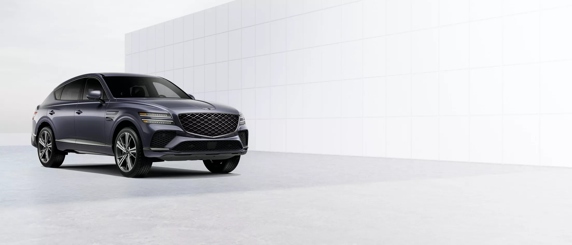 3/4 front passenger side view of 2027 Genesis GV80 Coupe in Ceres Blue, finance & leasing prices beside