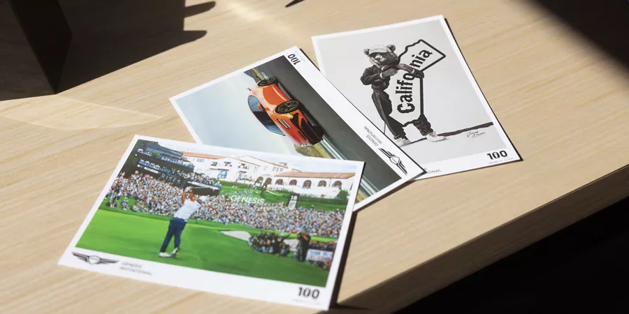 Close up of post cards on a table at the 2026 Genesis Invitational