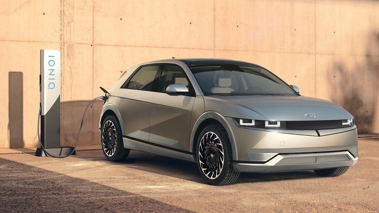 2022 Hyundai IONIQ 5 All-Electric Vehicle A gray 2022 Hyundai IONIQ 5 parked outside connected to an EV charging station