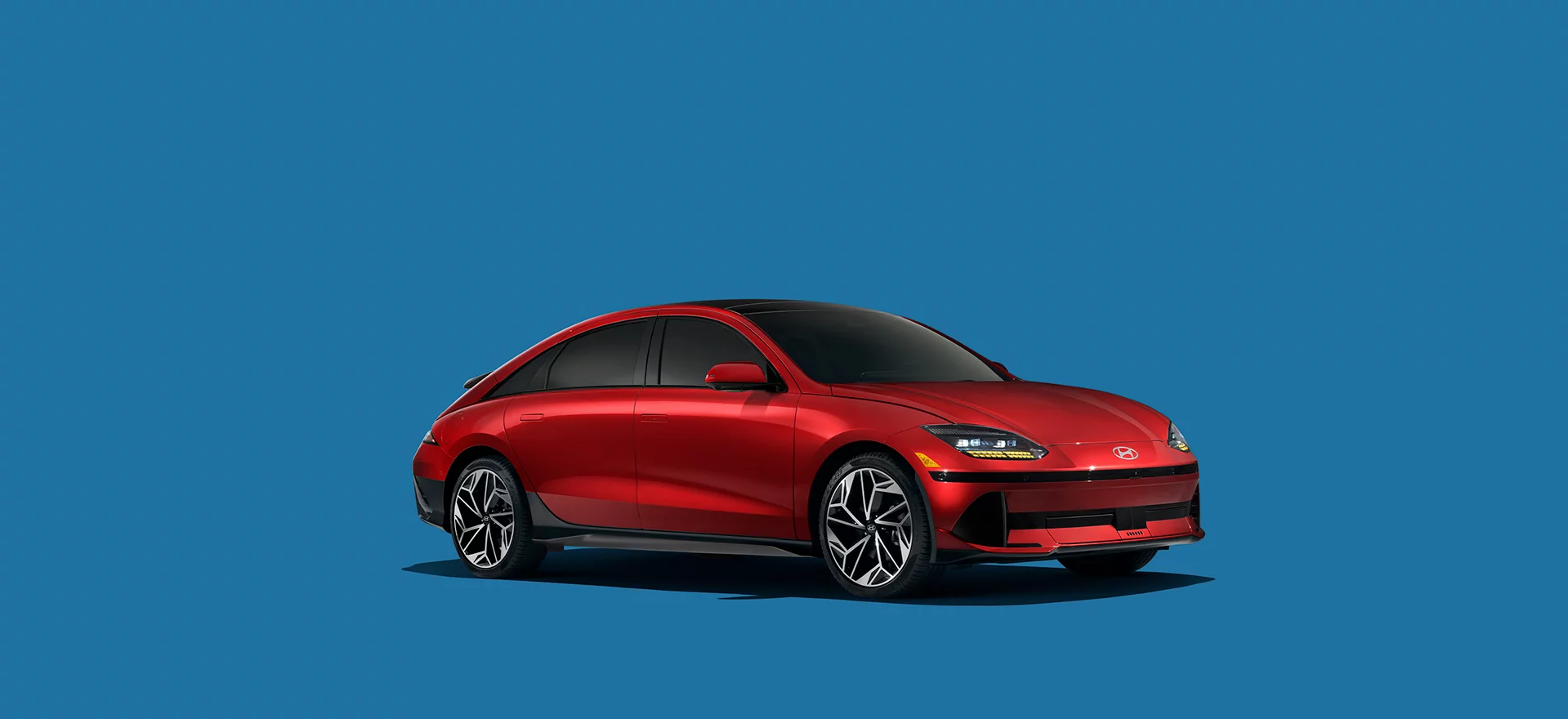 a red car on a blue background