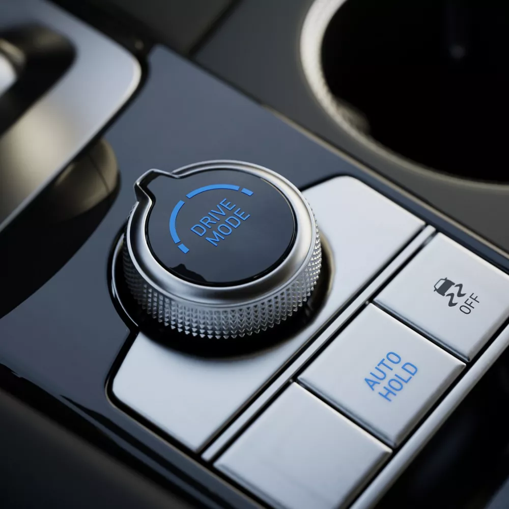 Close up interior shot of Drive Mode Selector in center console of Genesis G70