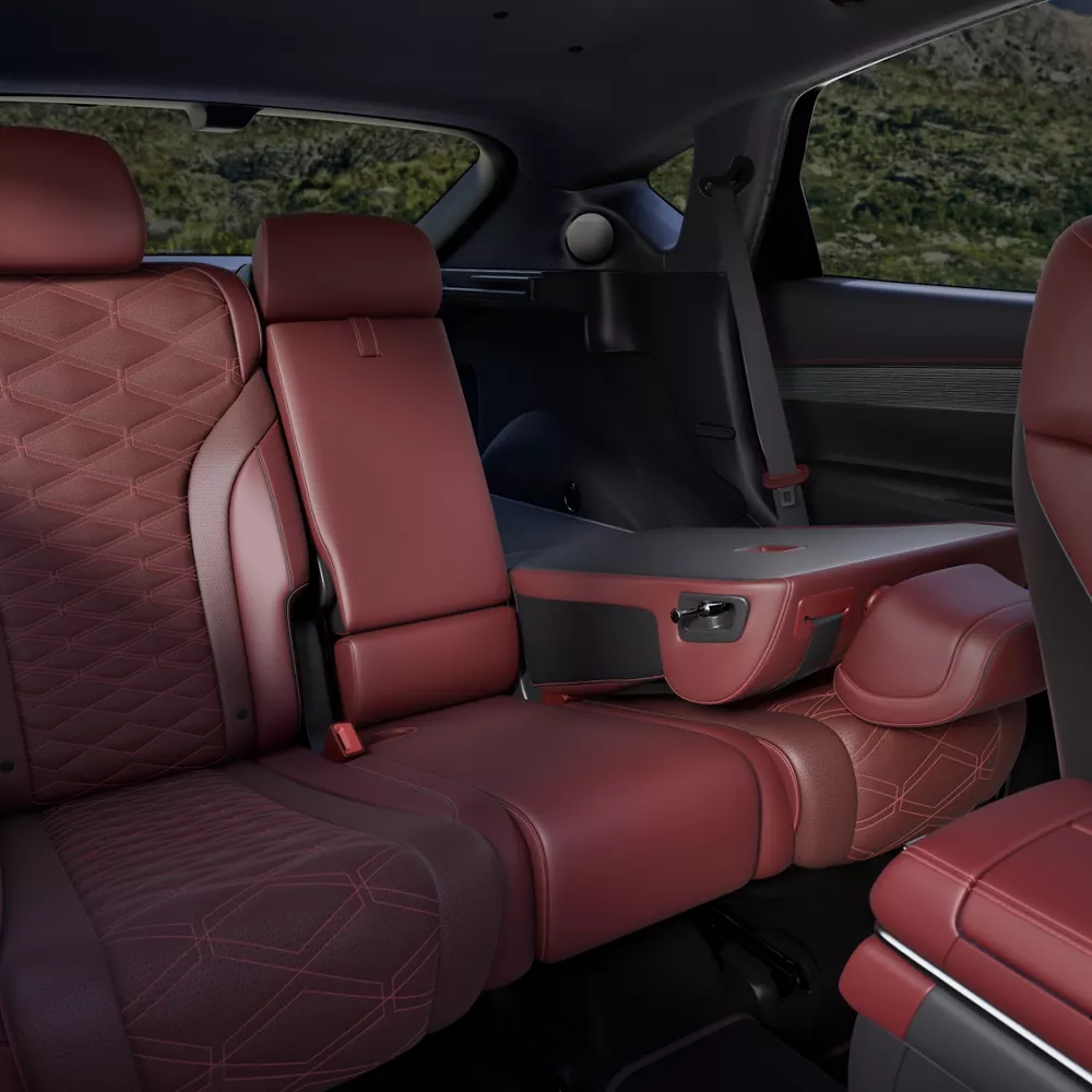 Backseat interior view of Sevilla Red Nappa leather seats inside Genesis GV80 Coupe
