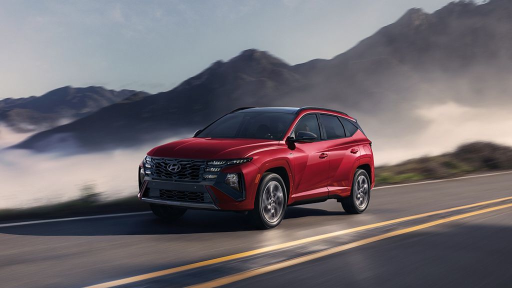 2025 Tucson Hybrid front 3/4 view driving