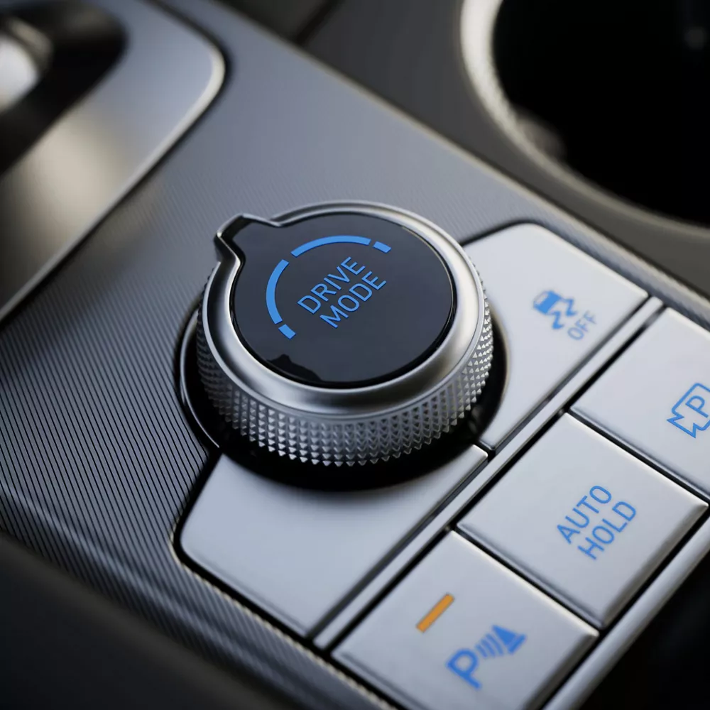 Close up interior shot of Drive Mode Selector​ in center console of Genesis G70