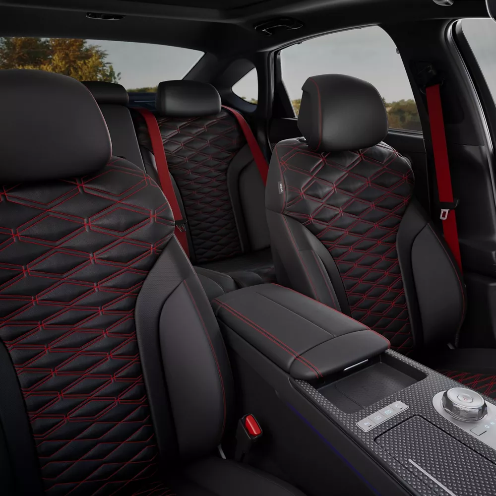 Interior windshield pov of front and back seats in 2026 Genesis G80 with black Nappa leather seating