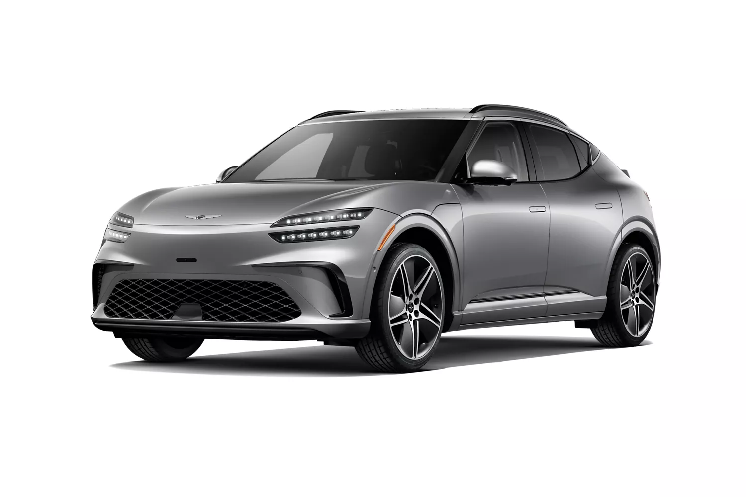 Driver side profile angle of 2026 Genesis GV60 in Savile Silver