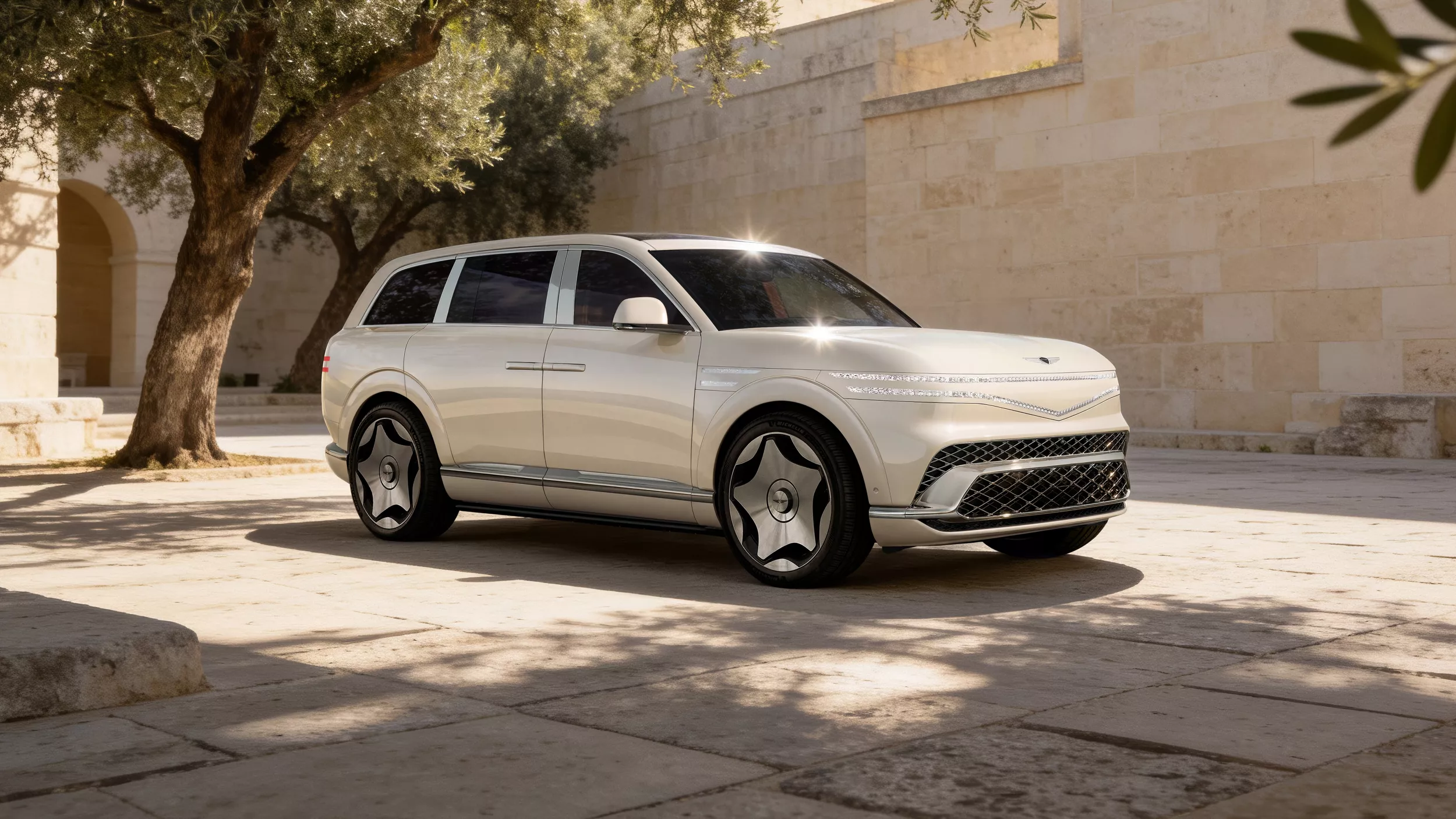 3/4 front passenger-side view of 2028 Genesis GV90 in Uyuni White in desert landscape