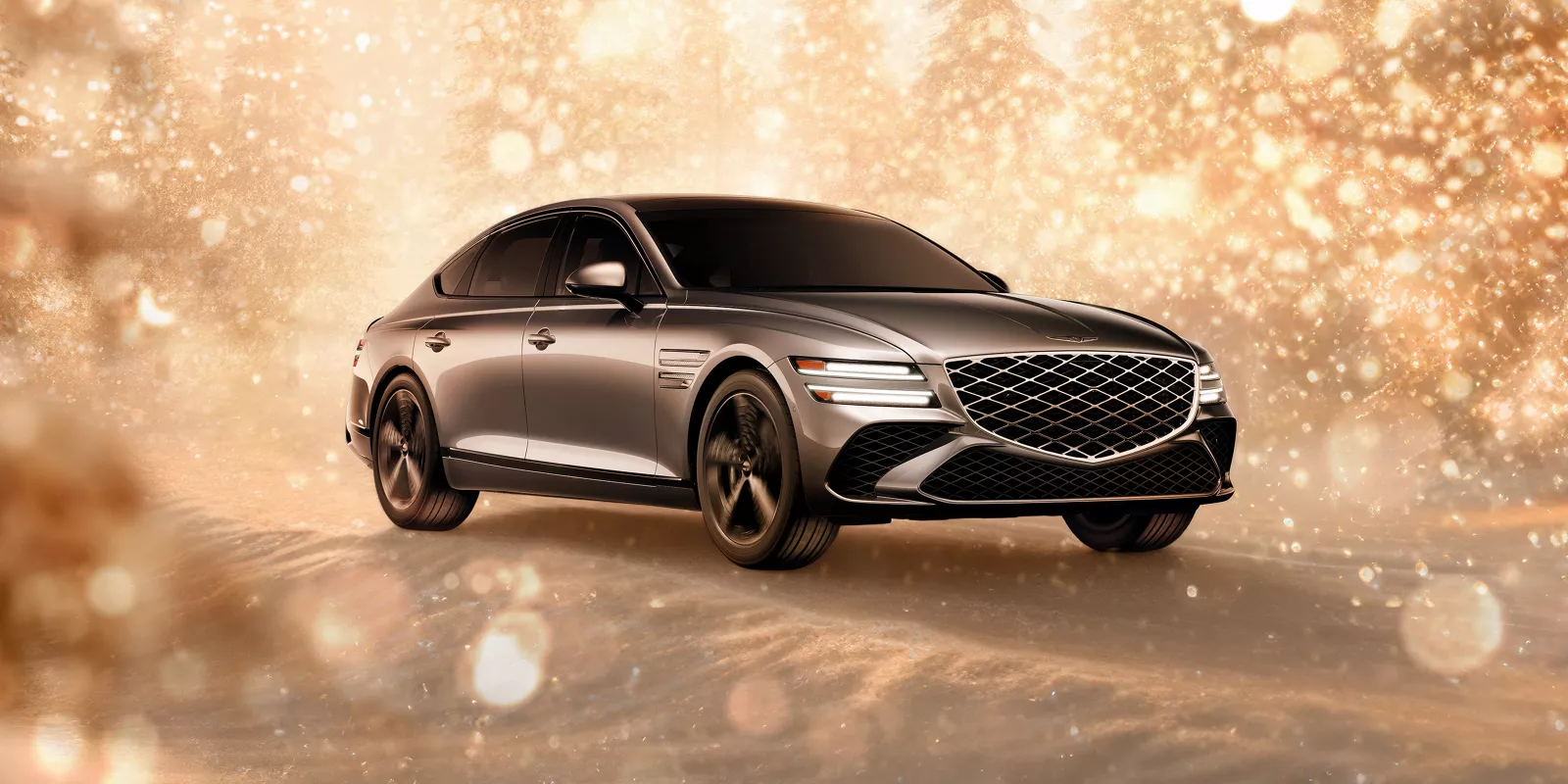 3/4 front passenger side view of gray 2025 Genesis G80 parked in snowy, gold sparkling environment