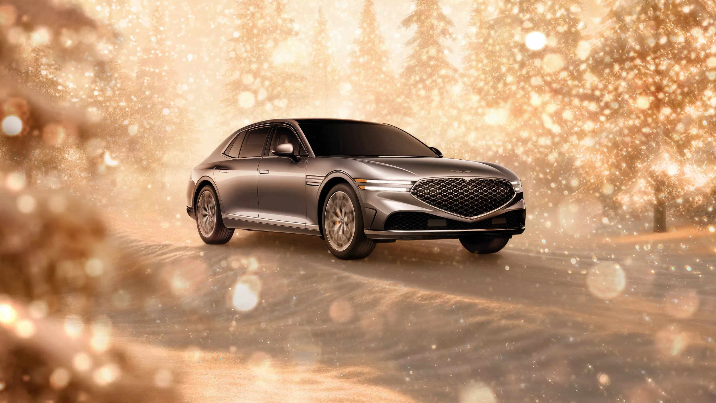 3/4 front passenger side view of gray 2025 Genesis G90 parked in snowy, gold sparkling environment
