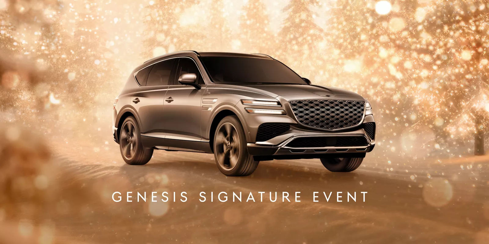 3/4 front passenger side view of gray 2025 Genesis GV80 parked in snowy, gold sparkling environment