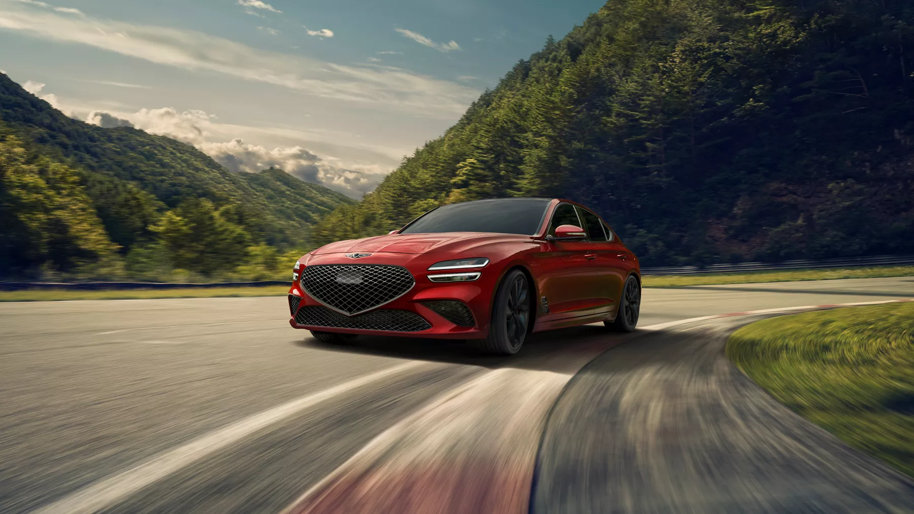 G70 driving on a mountain road.