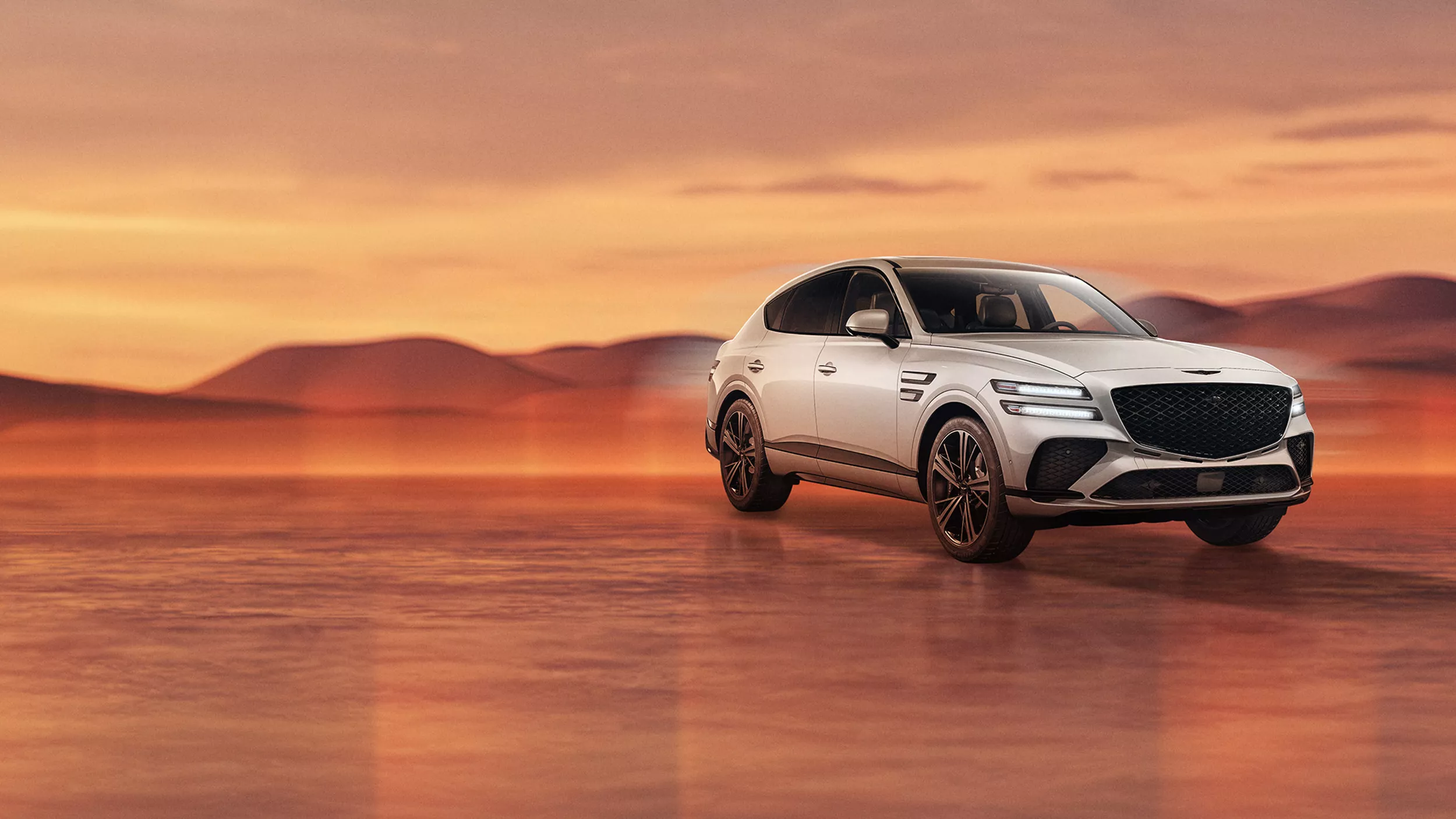 Genesis GV80 Coupe in Uyuni White on desert background