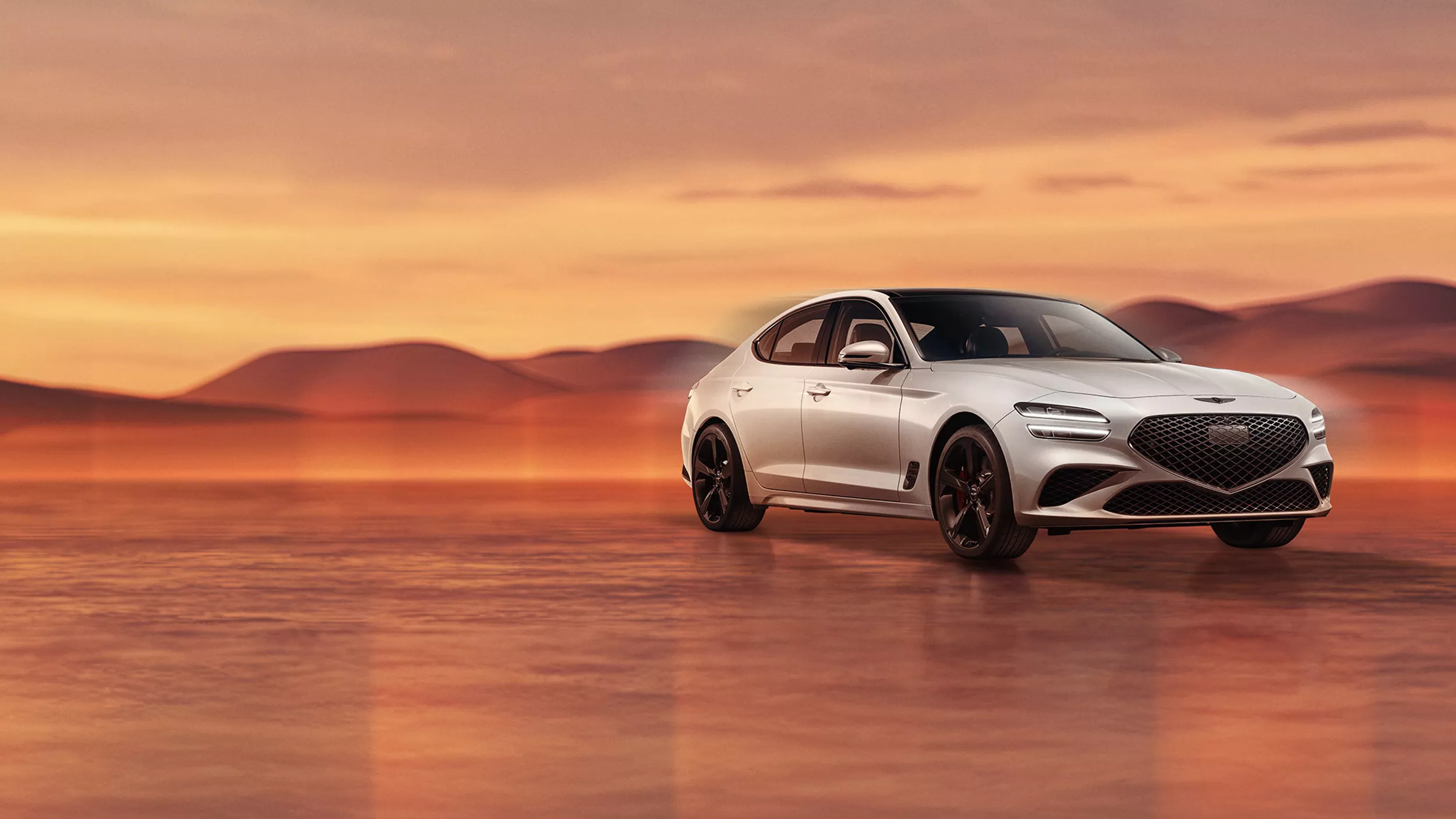 Genesis G70 in Alta White on desert background