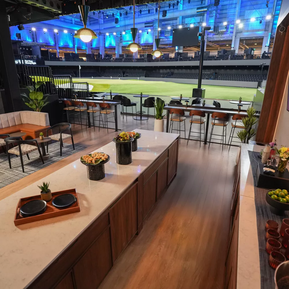 Image of the TGL course from the Genesis Lounge at the SOFI Center