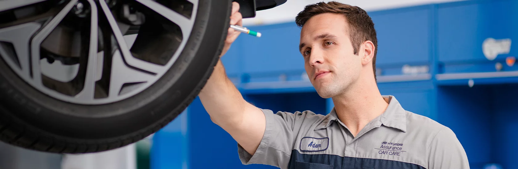 Mechanic Inspecting Hyundai