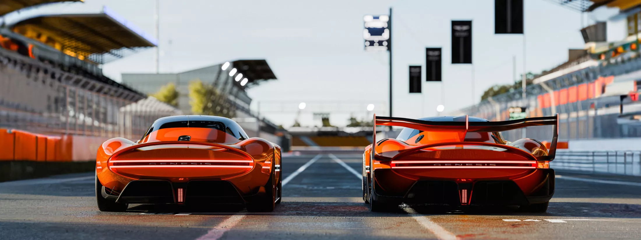 X Gran Racer and X Gran Berlinetta lined up side by side on a race track