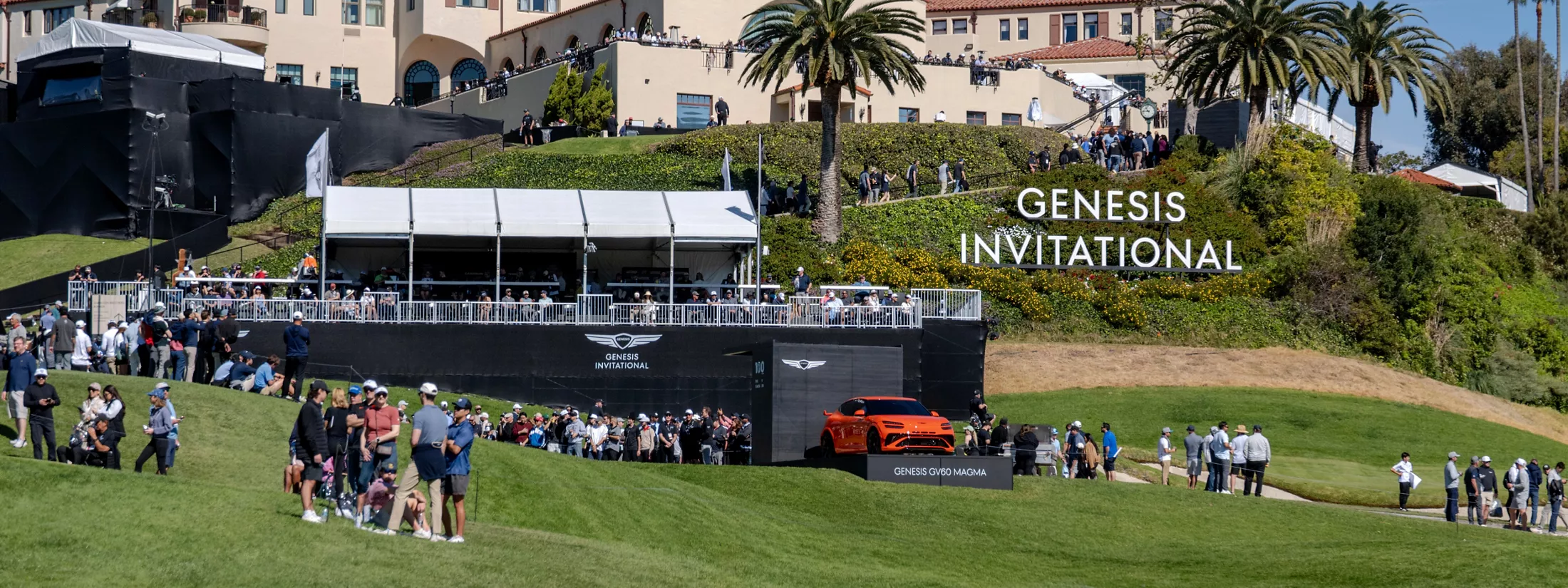 2026 Genesis Invitational at Riviera Country Club with spectators and Genesis GV60 Magma on display