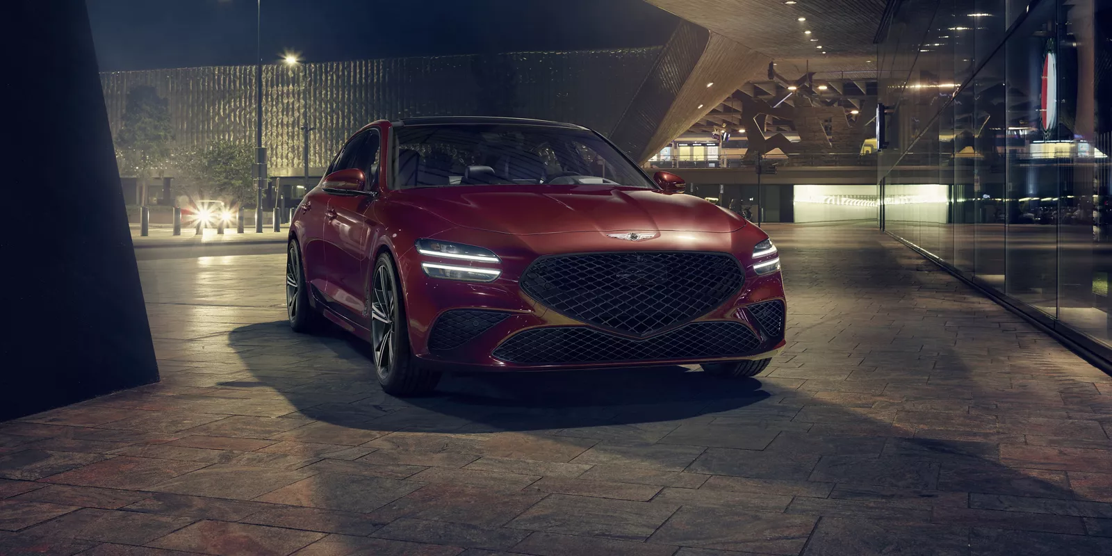 Genesis G70 front view in night scene