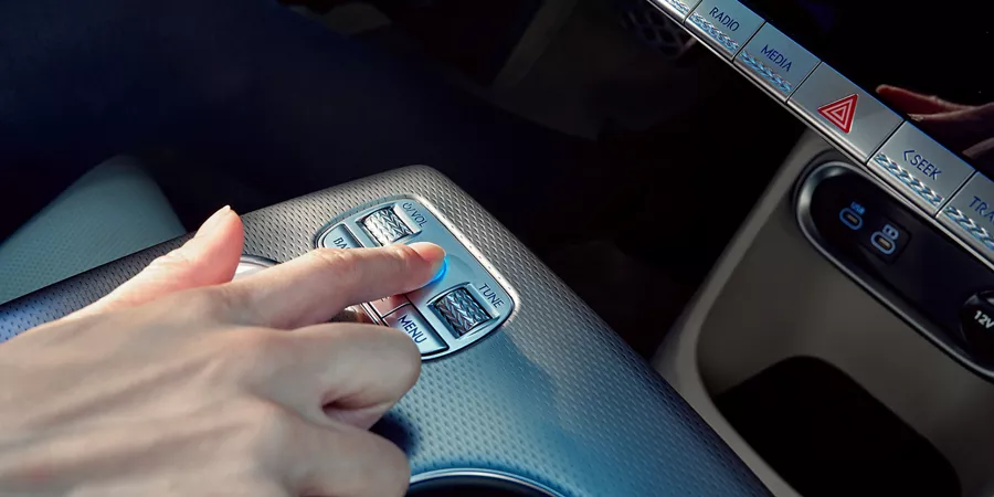 A woman using fingerprint authenticator.