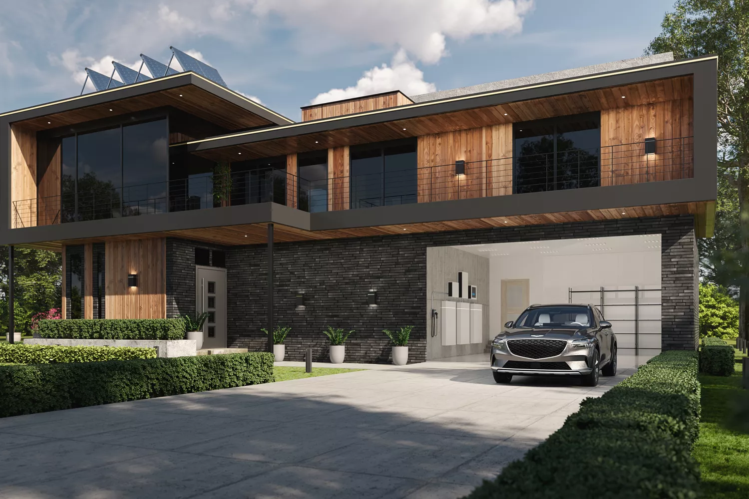 Front view of Genesis Electrified GV70 parked in front of a modern house with home chargers in the garage