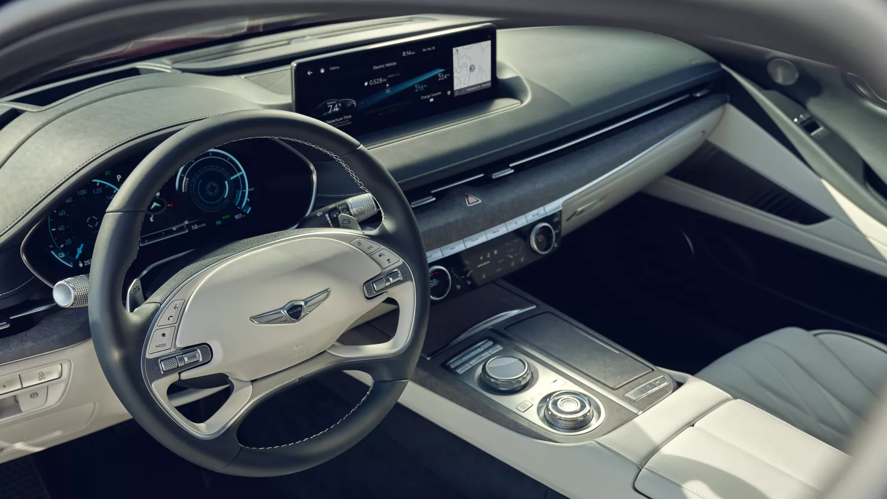 Electrified G80 steering wheel and infotainment screen.