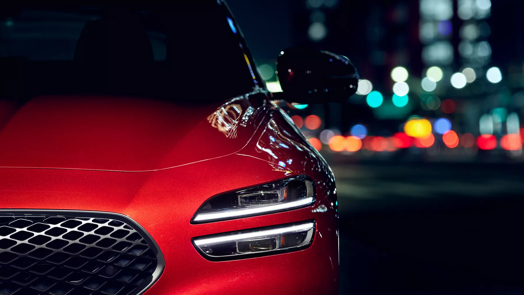 G70 front headlight in a city environment.