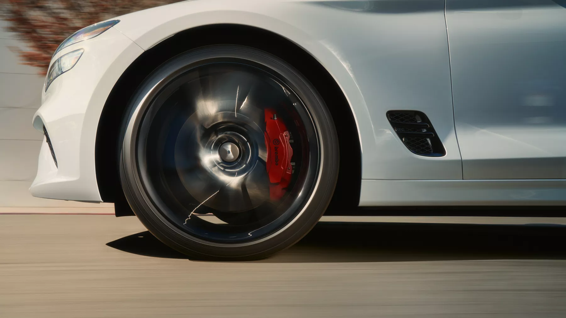 G70 front tire travelling down a highway.