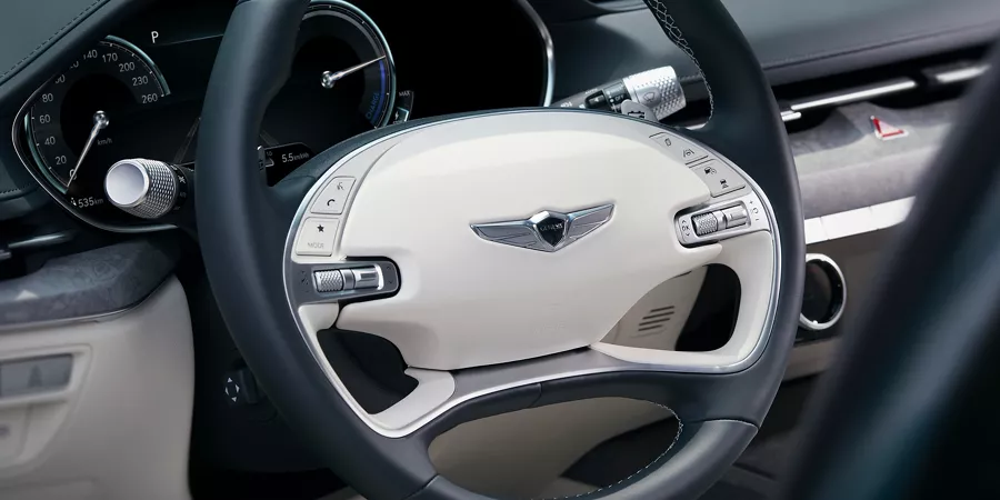 Electrified G80 steering wheel.