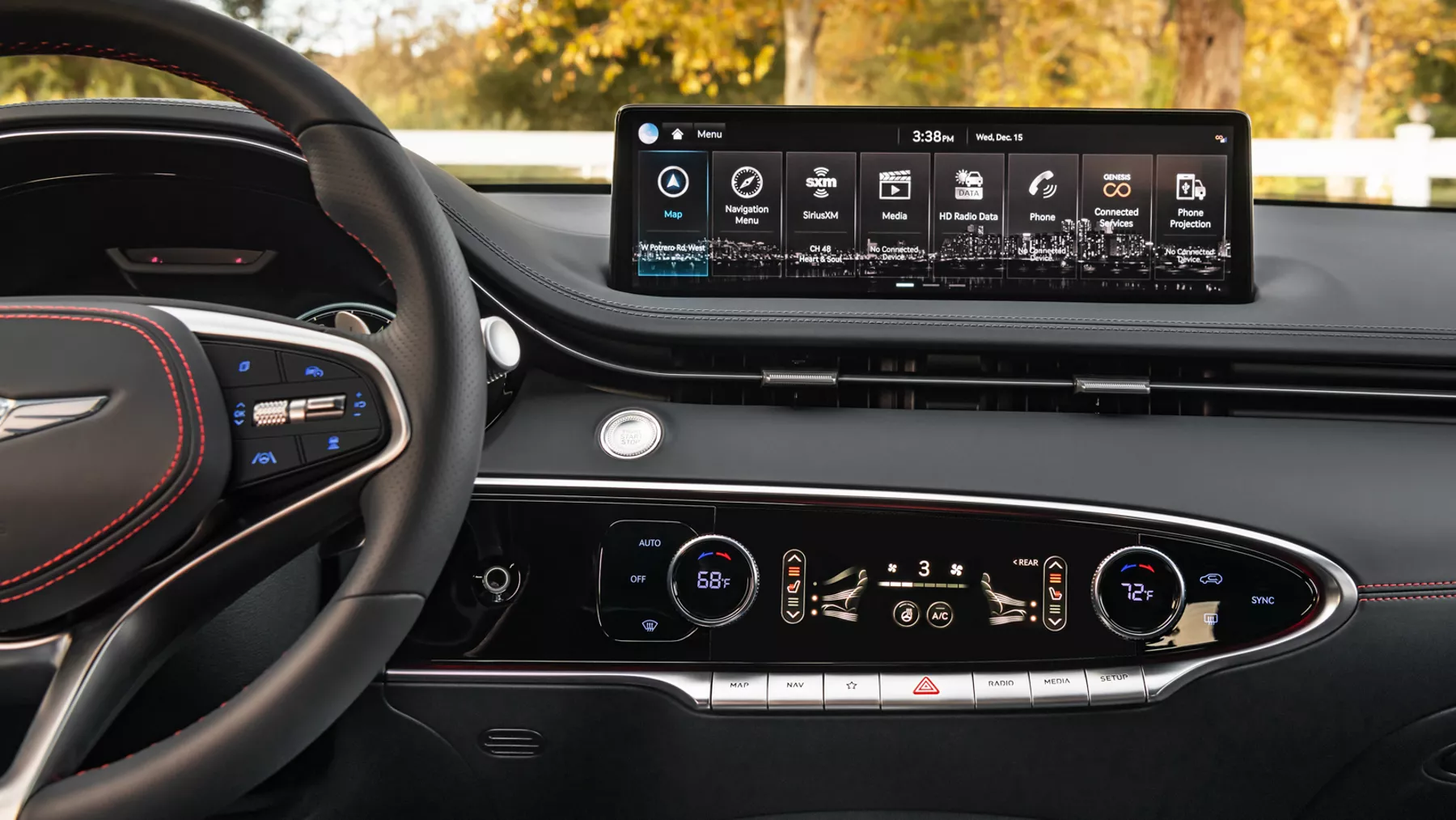 GV70 infotainment display and air conditioning and heating controls.
