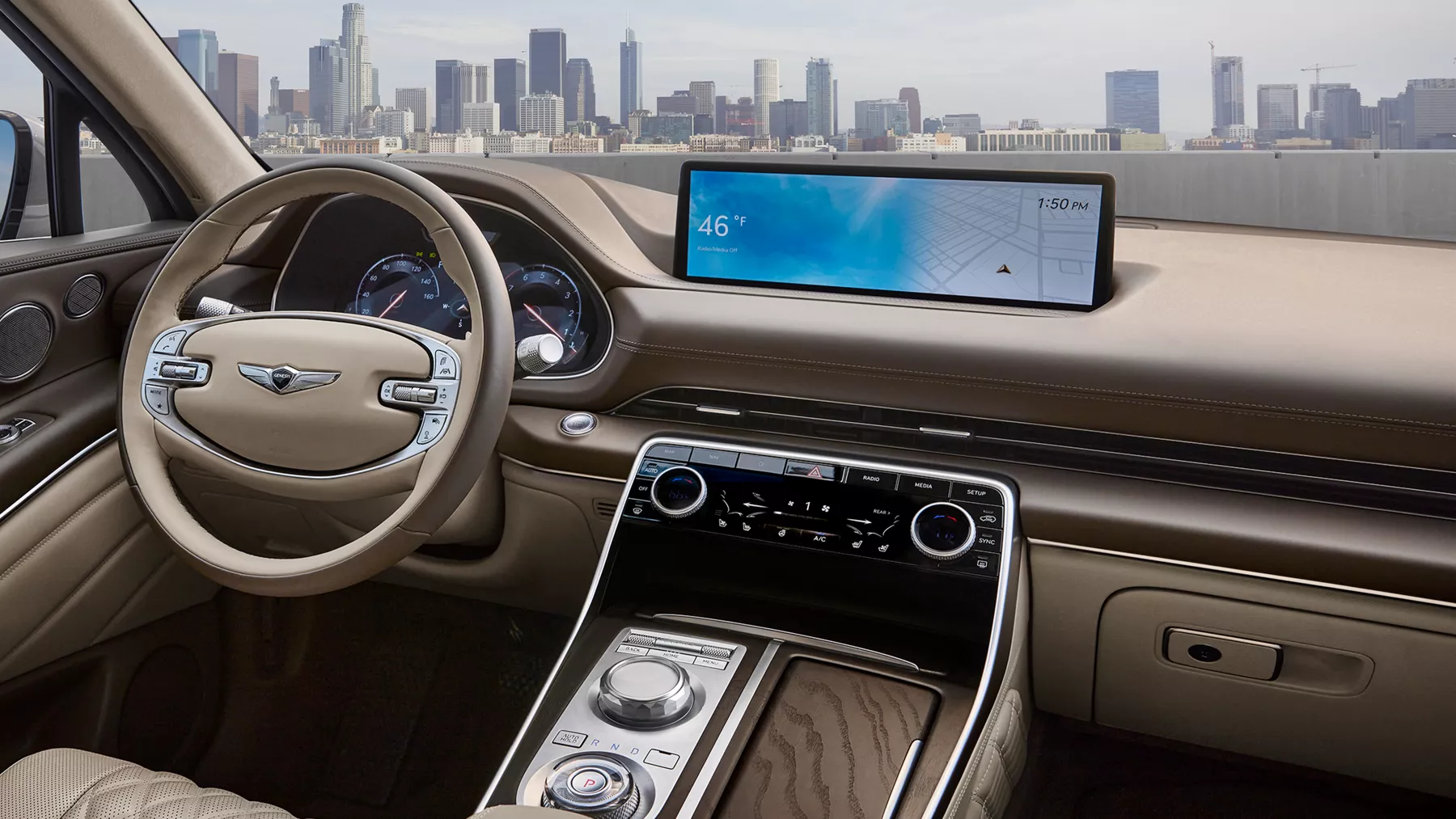 GV80 interior cabin with steering wheel and infotainment screen.