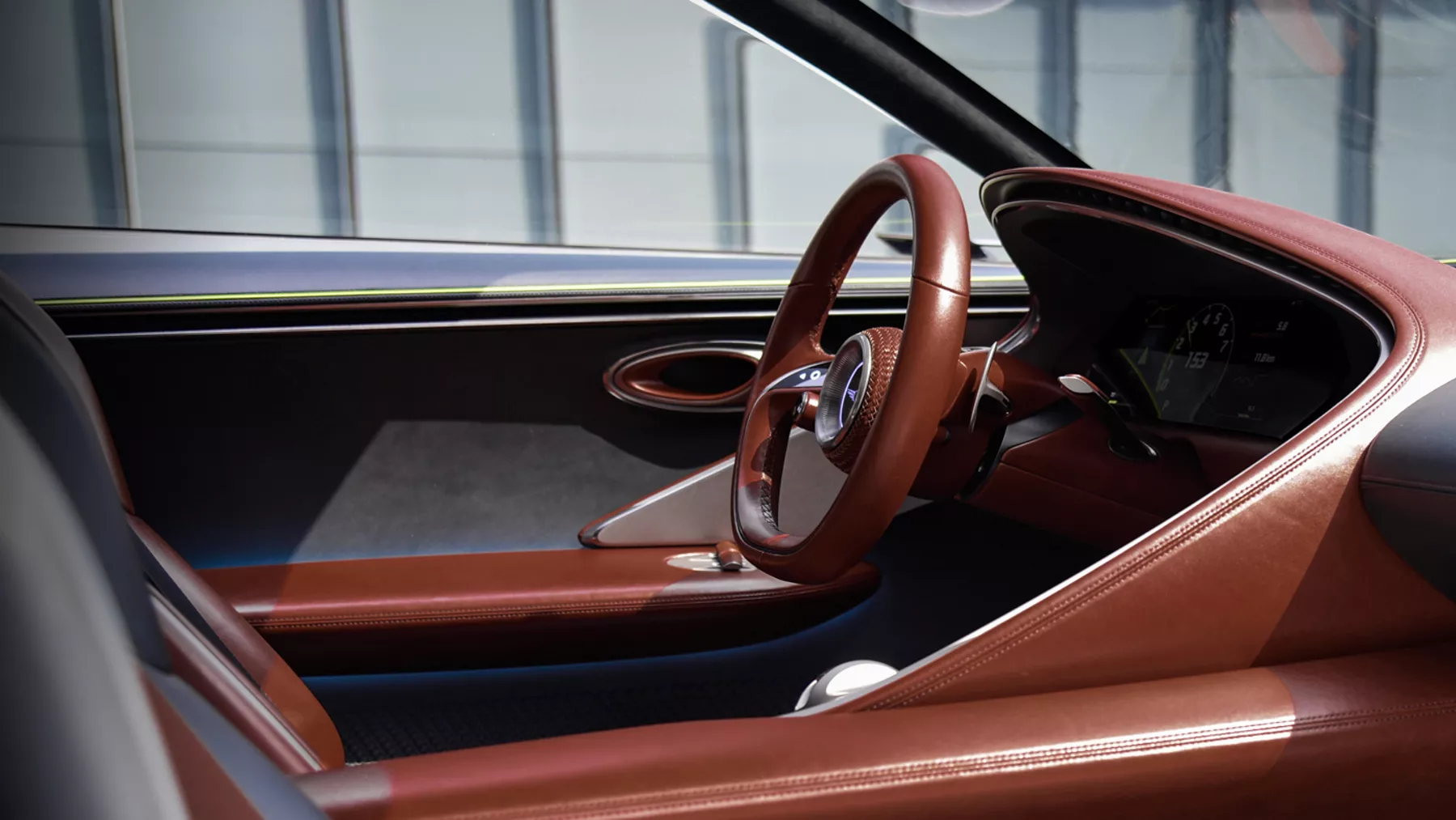X Concept steering wheel and driver’s-side door.