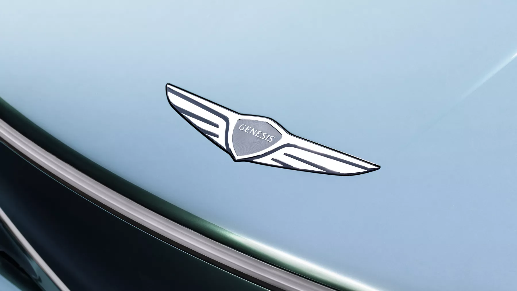 Close-up image of Genesis emblem on hood of X Speedium Coupe Concept.