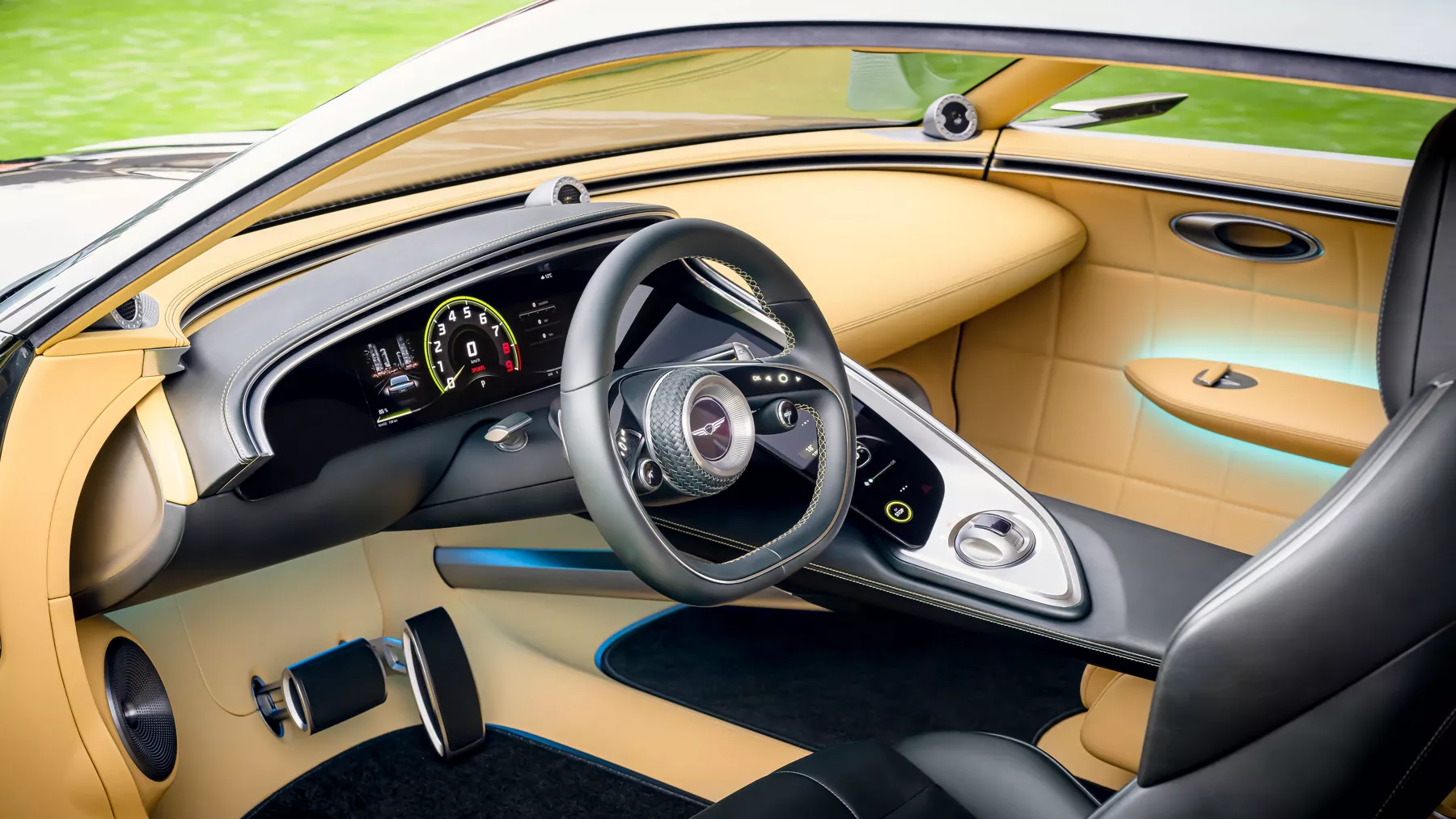 X Speedium Coupe Concept steering wheel and instrument gauge cluster.