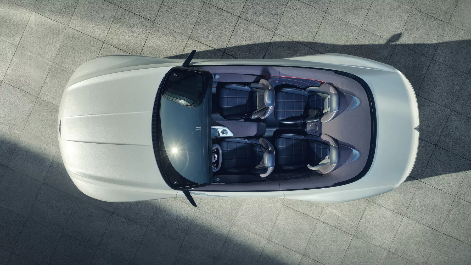 View of X Convertible Concept from above, with the convertible top down and displaying the four seats inside.