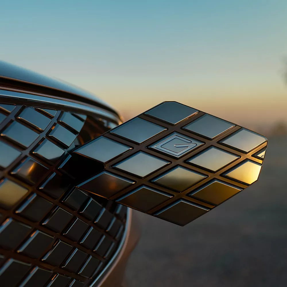 Electrified GV70 charging port in front grille.