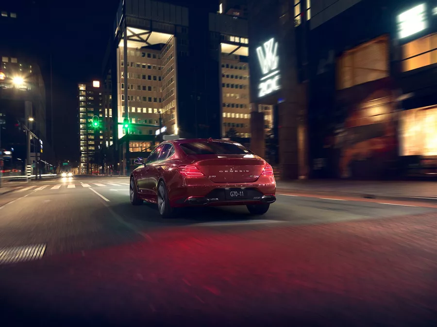 G70 at night on a city street.