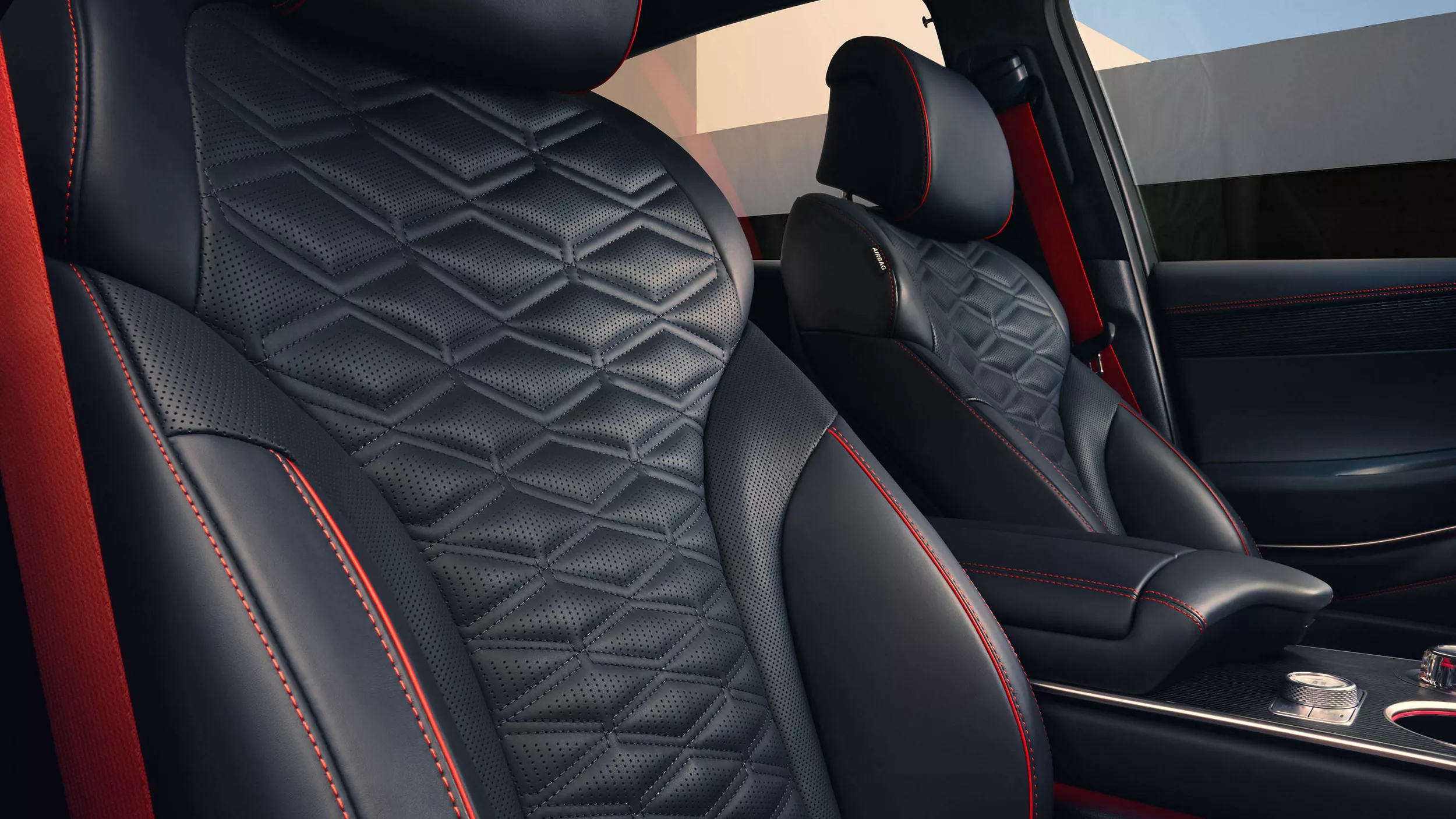 Interior front passenger seat pov view of Ultramarine blue Nappa leather seats in Genesis GV80 Coupe