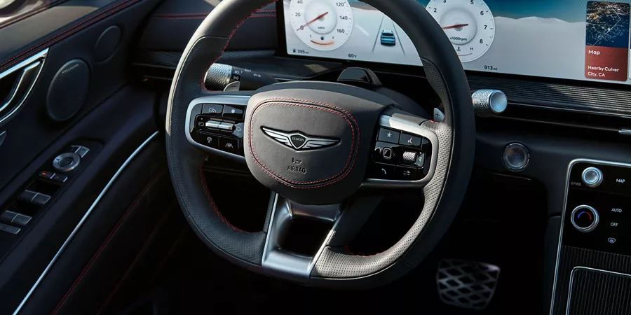 Close up of the GV80 Coupe's steering wheel.