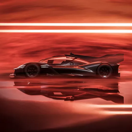 Side profile view of black Genesis GMR-001 Hypercar