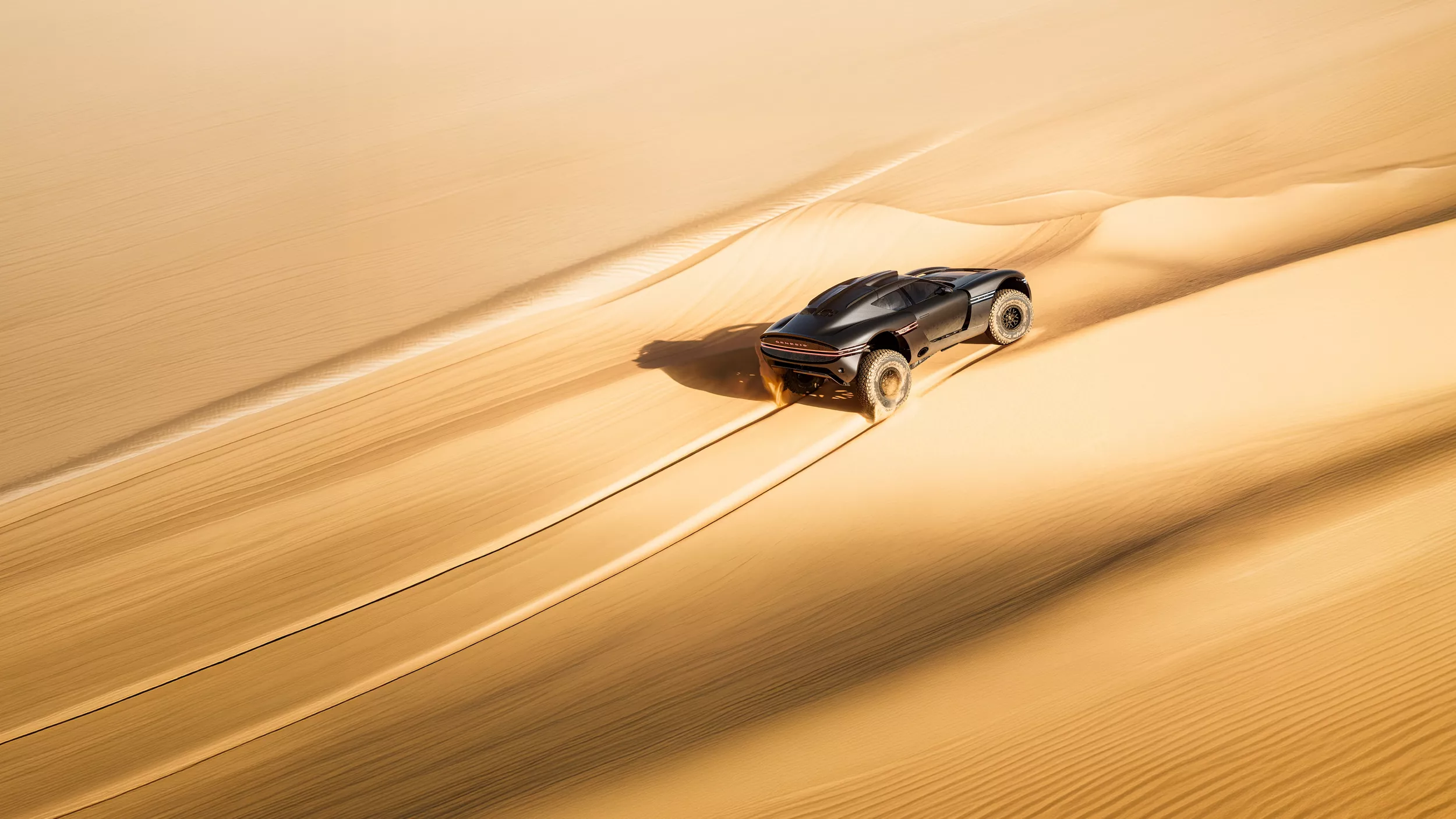 Overhead 3/4 rear passenger side view of Genesis X Skorpio Concept driving through expansive desert