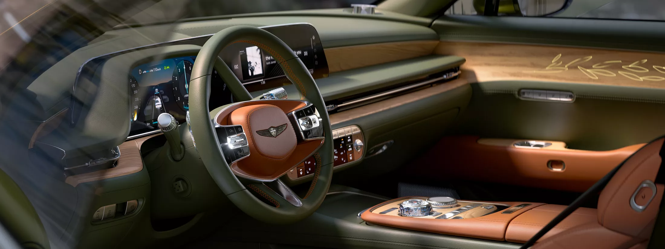Close up of driver side green and brown wood interior in Genesis X Gran Coupe Concept vehicle