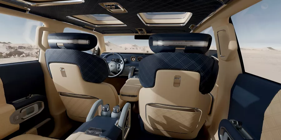 Rear interior passenger pov of front seats and steering wheel in Genesis X Gran Equator Concept