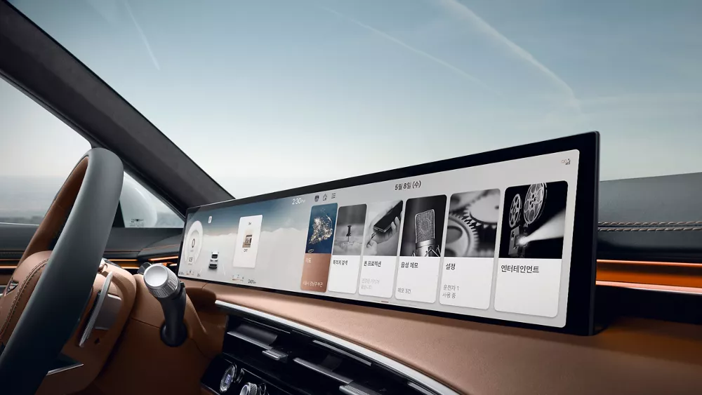 Close up of the 2026 GV70's digital dashboard, windshield and steering wheel