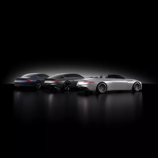 3 rear-facing Genesis X Gran Trilogy concept vehicles parked side by side against a black background